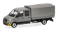 HER098328 - Camion MAN TGE gris à double cabine et parechoc à rayures jaunes - Herpa