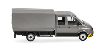 HER098328 - Camion MAN TGE gris à double cabine et parechoc à rayures jaunes - Herpa