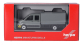 HER098328 - Camion MAN TGE gris à double cabine et parechoc à rayures jaunes - Herpa