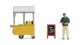 NO 16505 - Tiny-Scenes « Stand de hot-dogs » : Vendeur avec chariot et enseigne publicitaire - Noch